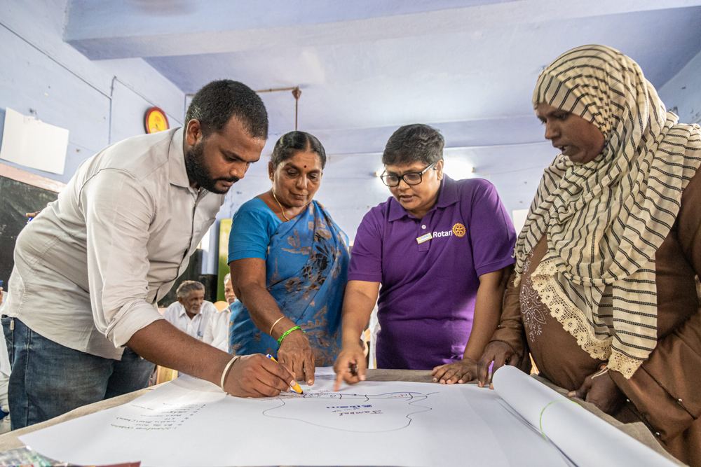 Rotary members working with a community in India